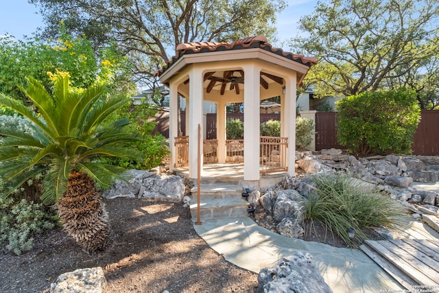 view of patio featuring ceiling fan