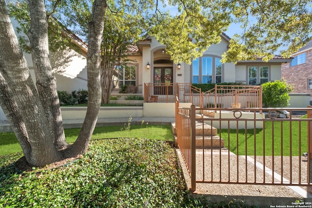 exterior space with a front lawn