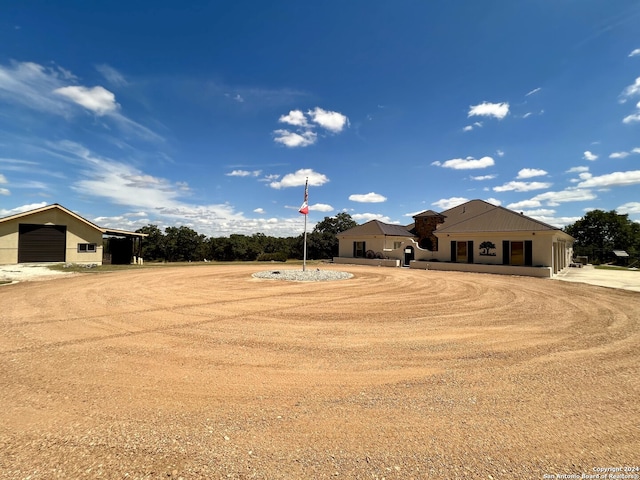 view of yard featuring a garage