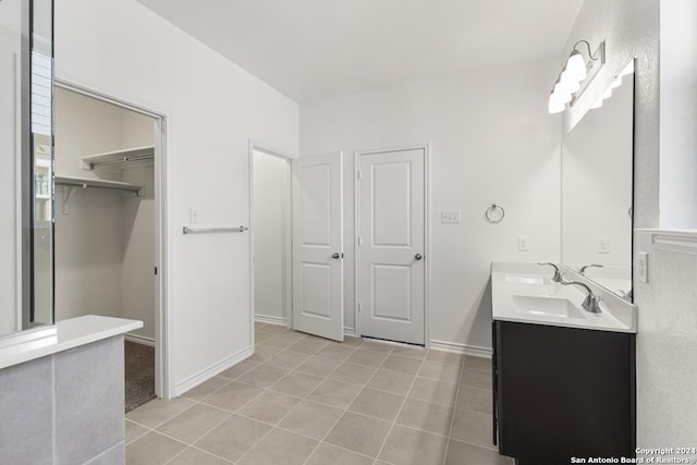 bathroom with vanity and tile patterned floors