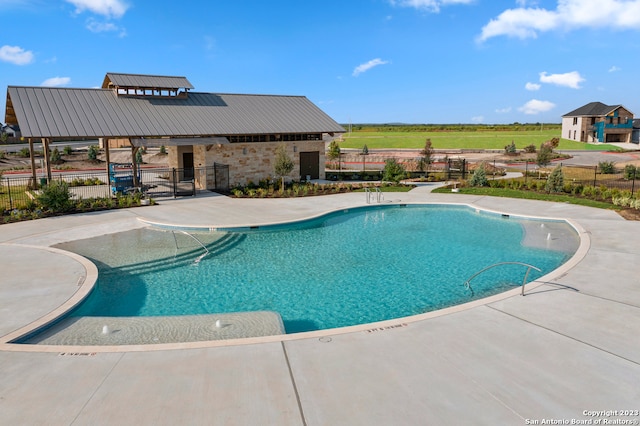 view of pool with a patio