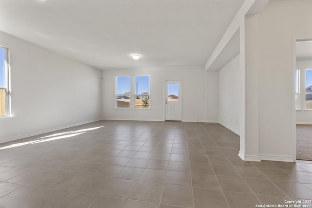 14717 House Wren Fall, San Antonio, TX 78253 - unfurnished room with baseboards and tile patterned floors