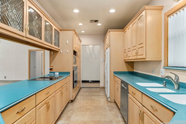 kitchen with visible vents, dark countertops, glass insert cabinets, stainless steel appliances, and light brown cabinetry