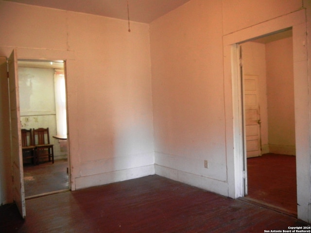 empty room featuring hardwood / wood-style flooring