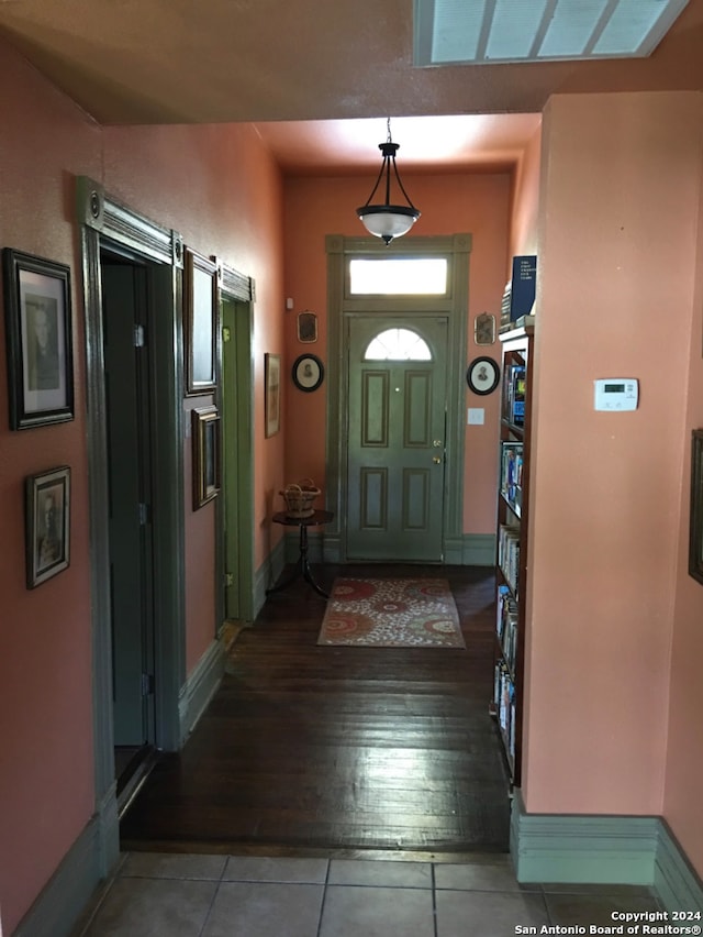 entrance foyer featuring dark hardwood / wood-style flooring