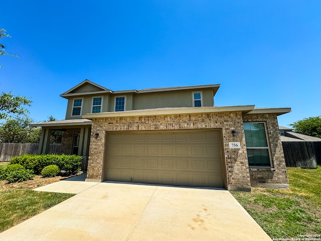 view of front of house with a garage