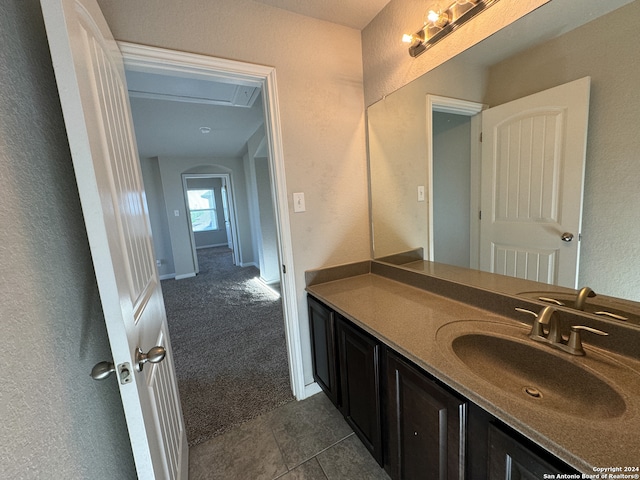 bathroom with vanity and tile patterned floors