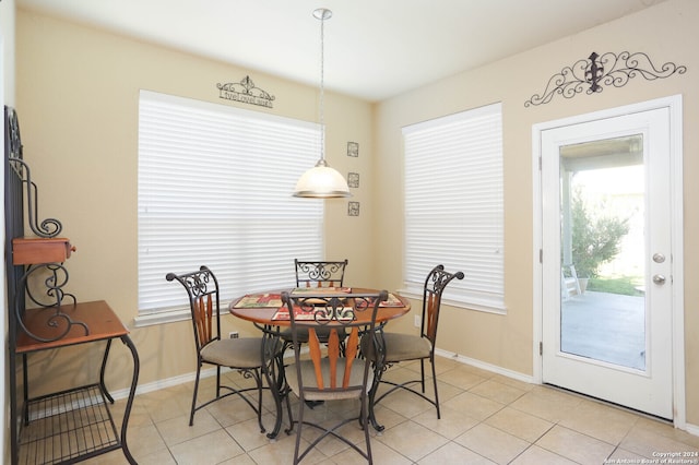 dining room featuring light tile patterned floors