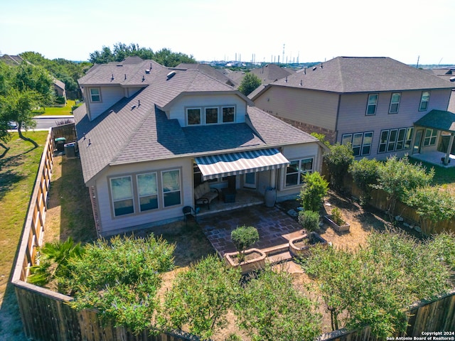 back of house featuring a patio