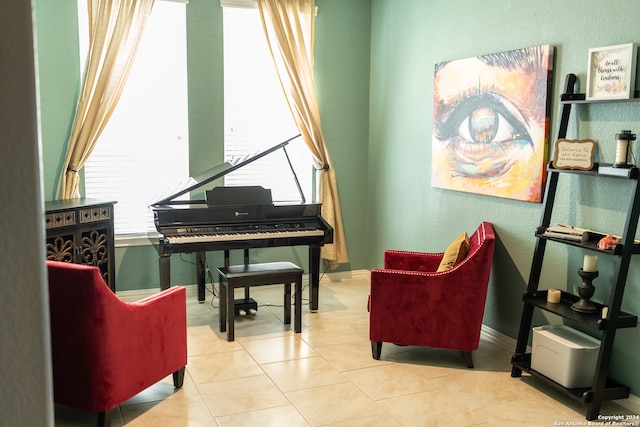 sitting room with light tile patterned floors