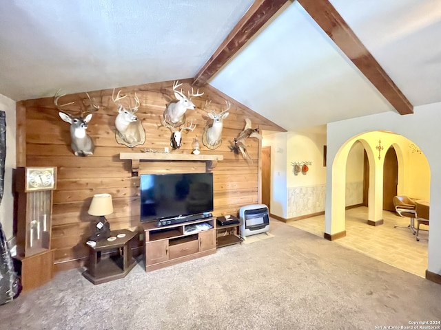 living room featuring wood-type flooring, wooden walls, and lofted ceiling with beams