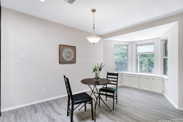 dining room featuring light hardwood / wood-style flooring