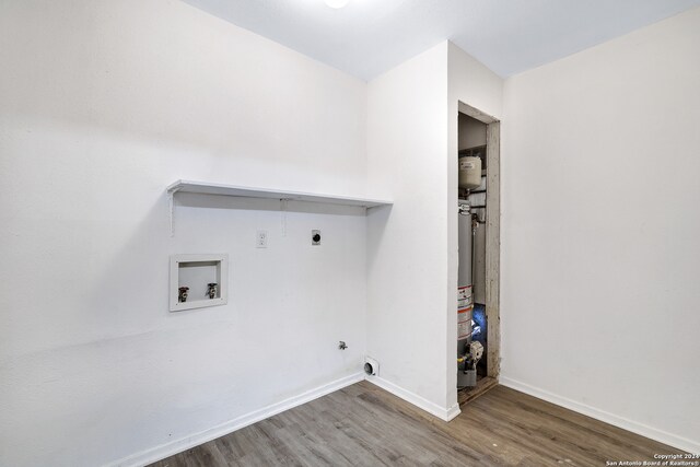 laundry area featuring wood-type flooring, electric dryer hookup, washer hookup, and hookup for a gas dryer