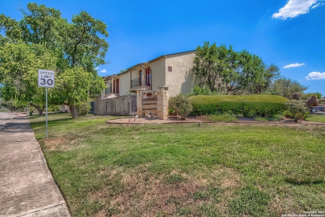 view of yard with fence