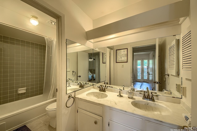 full bathroom with toilet, vanity, shower / bath combo, and tile patterned floors