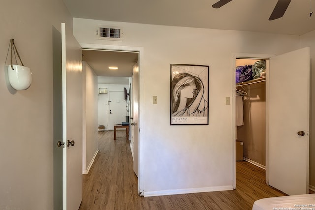 hall featuring hardwood / wood-style flooring