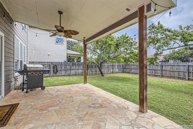 view of patio / terrace featuring a ceiling fan, a fenced backyard, and grilling area