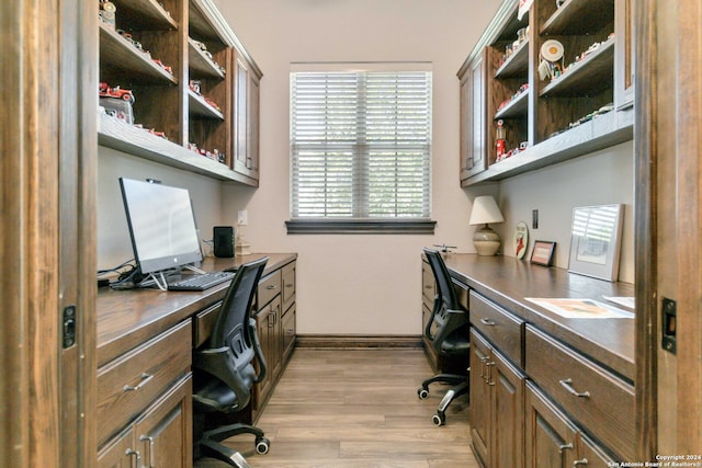 office with light wood-type flooring