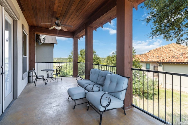 balcony featuring ceiling fan