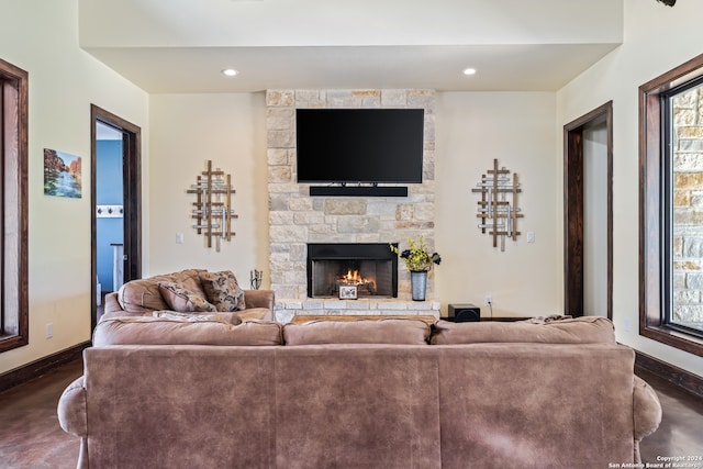 living room featuring a fireplace