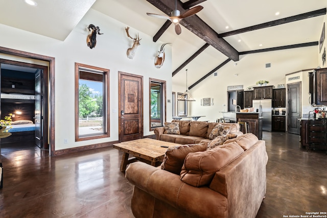 living room with ceiling fan, beam ceiling, and high vaulted ceiling