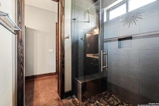 bathroom featuring an enclosed shower