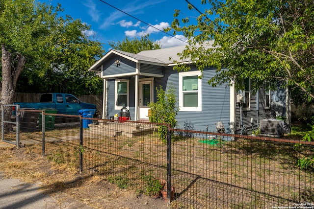 bungalow-style home featuring central air condition unit