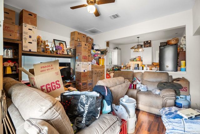 living room with ceiling fan and hardwood / wood-style floors