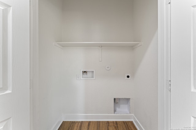 washroom featuring hardwood / wood-style floors, hookup for a washing machine, hookup for a gas dryer, and hookup for an electric dryer