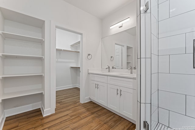 bathroom featuring vanity and wood-type flooring