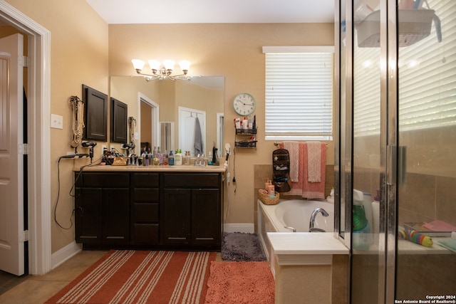 bathroom featuring vanity, tile patterned flooring, separate shower and tub, and a healthy amount of sunlight