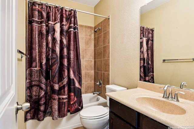 full bathroom featuring shower / tub combo with curtain, vanity, and toilet