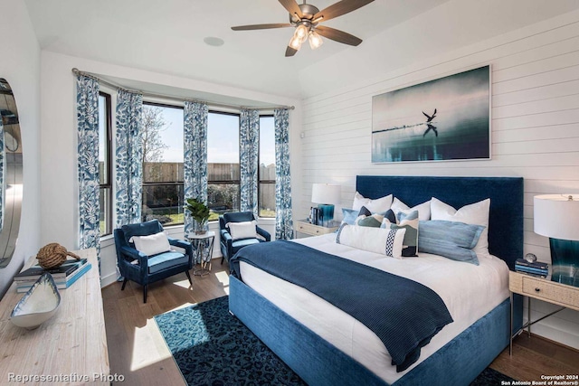 bedroom with ceiling fan and wood-type flooring