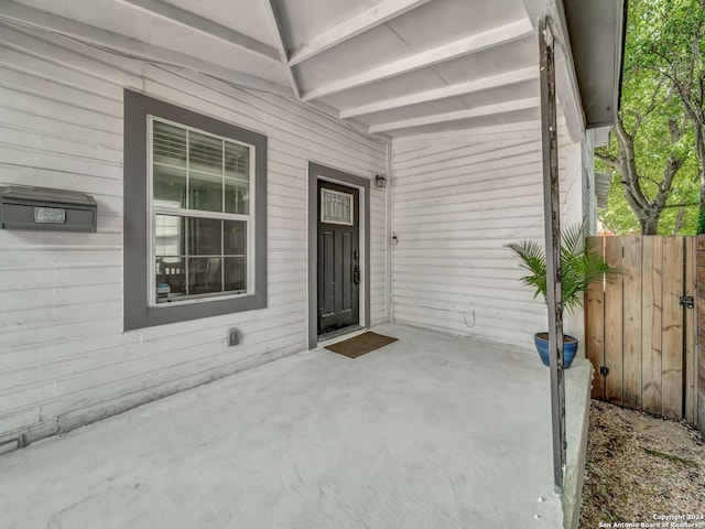 property entrance with a patio