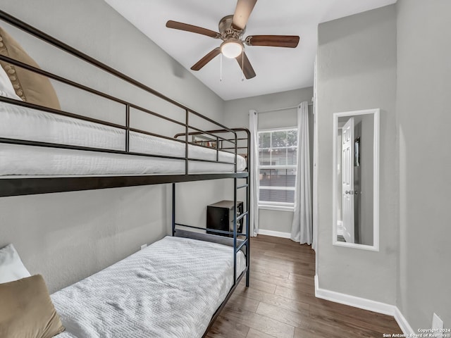 bedroom featuring dark hardwood / wood-style flooring