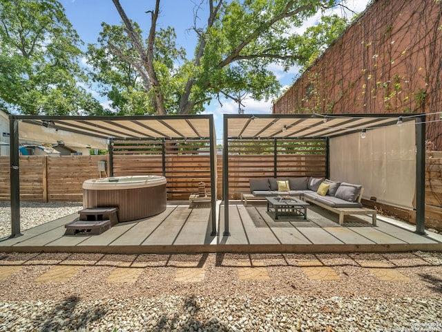 view of patio with a hot tub and outdoor lounge area