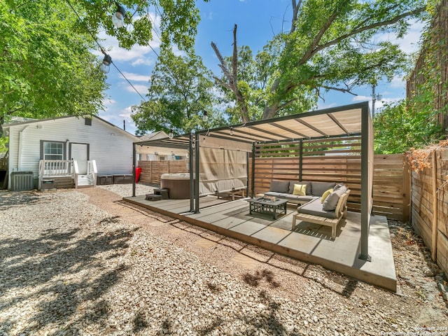 view of yard featuring a hot tub, cooling unit, a pergola, an outdoor living space, and a patio