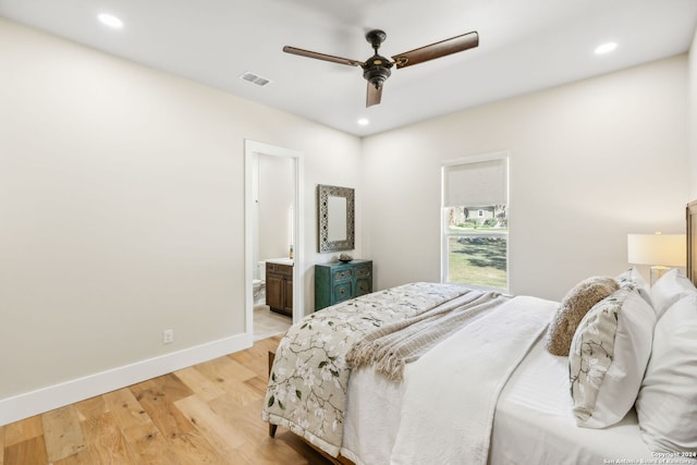 bedroom featuring light wood finished floors, baseboards, visible vents, and recessed lighting