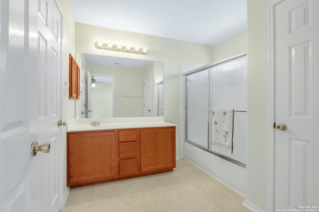 bathroom featuring ceiling fan, tile patterned floors, and vanity