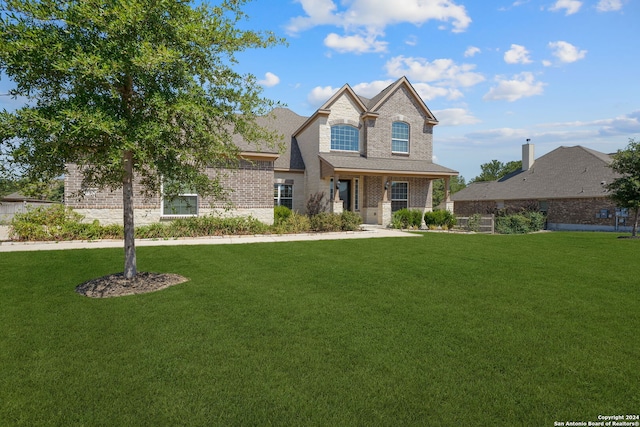 view of front of property with a front lawn