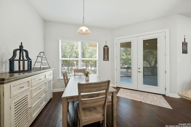 dining space featuring french doors and dark hardwood / wood-style flooring