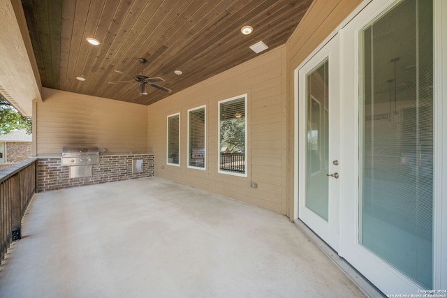 view of patio / terrace with ceiling fan and area for grilling