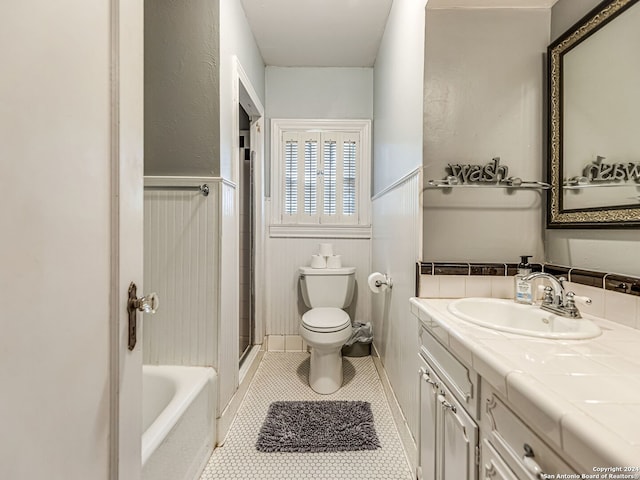 full bathroom featuring tile patterned flooring, toilet, plus walk in shower, and vanity