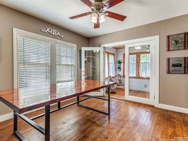 office with ceiling fan and hardwood / wood-style floors