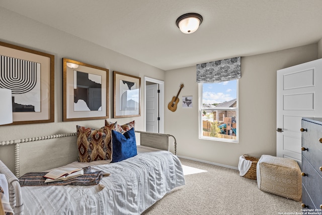 bedroom featuring carpet flooring