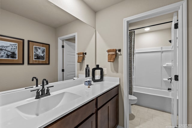 full bathroom featuring toilet, shower / bath combo with shower curtain, vanity, and tile patterned flooring