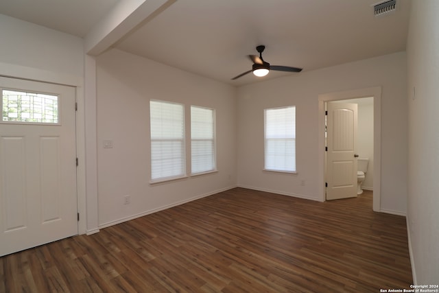 foyer featuring ceiling fan and dark wood-type flooring