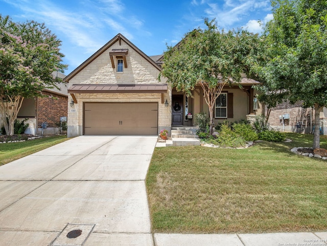 view of front facade with metal roof, a garage, concrete driveway, a standing seam roof, and a front yard