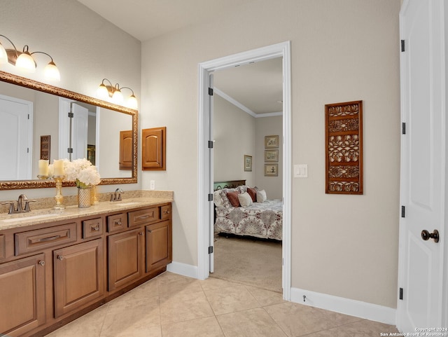 bathroom featuring tile patterned flooring and vanity