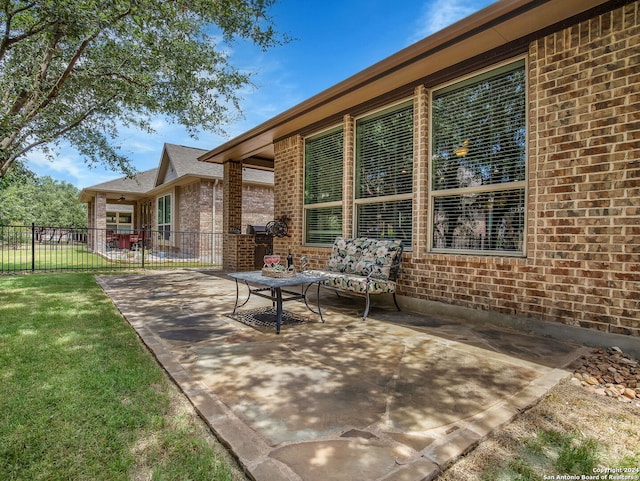 view of patio / terrace with fence